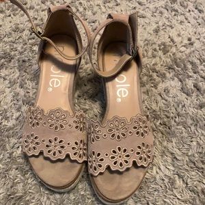 Taupe ankle strap eyelet cutout wedges.